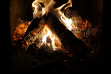 The Warmth Of A Fire In A Home Fireplace