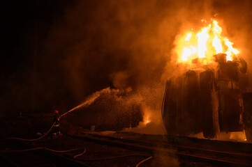 Wall Mural - Fire at a transformer substation after being hit by a missile 