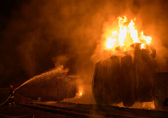 Wall Mural - Fire at a transformer substation after being hit by a missile 