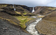 Hengifoss, the third highest waterfall in Iceland, located in Hengifossá in Fljótsdalshreppur, East Iceland, is surrounded by basaltic strata with thin, red layers of clay between the basaltic layers