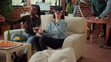 Wall Mural - Team of women winning video games play with vr glasses, feeling happy and celebrating gaming win on television console. Playful people enjoying gathering and having fun together.