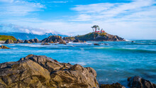 Battery Point Lighthouse And Rocky Bay At High Tide In Crescent City, California. Long Exposure Photography.