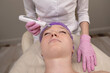 person receiving a facial treatment