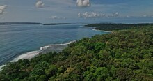 Bocas Del Toro Panama Aerial V11 Drone Flyover Paunch Beach Capturing Natural Reserve Tropical Rainforest And Beautiful Seascape With Waves Hitting The Shore - Shot With Mavic 3 Cine - April 2022