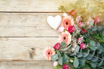 Wall Mural - Beautiful bouquet of flowers with gerberas and lisianthus on old wooden background - greeting card - mother's day, birthday, wedding - top view with copy space