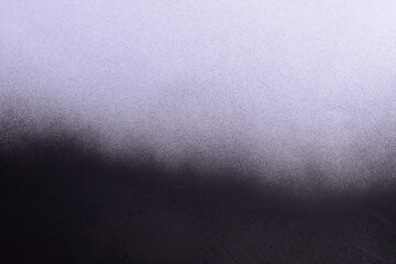 gradient black spray paint on a white paper background