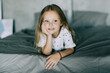 © F8  \ Suport Ukraine - Portrait of cute girl lying in the bed