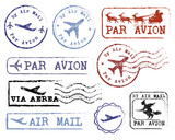 Fototapeta Na ścianę - Beautiful grungy old rubber post stamp By Air Mail with a plane vector set