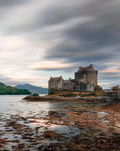 View Of Eilean Donan Castle At Sunset, Isle Of Sky, Highlands, Scotland, United Kingdom.