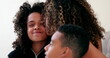© Marco - African mother kissing and embracing daughter, candid parent love and affection