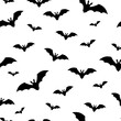 Seamless pattern with bats. Flock of bats. Hand drawn vector illustration. Isolated objects on white background.