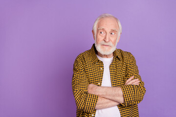 Wall Mural - Photo portrait of concerned grandpa doubt not believe white hair wear trendy yellow plaid shirt isolated on lilac purple color background