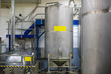 Stainless vertical steel tanks with pressure meter in equipment tank chemical cellar at the with scrolling wheel stainless steel tanks cleaning