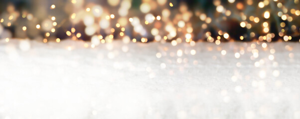 Wall Mural - christmas winter background with bokeh lights on snow