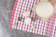 Chicken eggs with quail eggs and dough on tablecloth