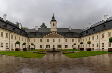 Sticker - view of the spacious courtyard and entrance of the manor House in Svaty Anton in Slovakia