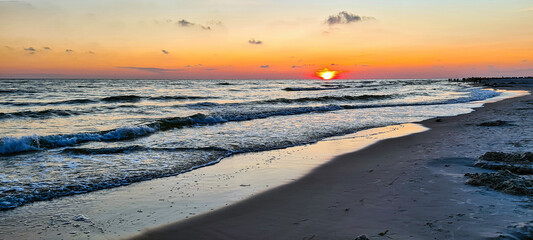 Wall Mural - Dramatic sunset over Baltic Sea in Lubiatowo, Pomerania, Poland