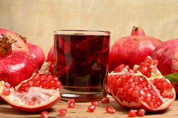 Wall Mural - pomegranate juice with pomegranate fruit