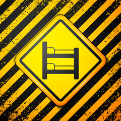 Wall Mural - Black Bunk bed icon isolated on yellow background. Warning sign. Vector