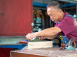© EKKAPON - The carpenters are using spokeshave to decorate the woodwork.