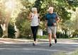 © Kay Abrahams/peopleimages.com - Road running, fitness and senior couple training together on a exercise and workout run. Sports and health motivation of elderly man and woman runner in retirement living a healthy lifestyle