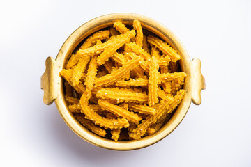 Wall Mural - Bhajni chakli sticks or crunchy murukku snack made using diwali festival, favourite munching food