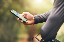 Hands, search and gps on smartphone for cycle athlete lost in nature park with online map app. Digital navigation and connection with 5g for bicycle person looking for direction information.