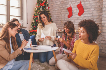 Wall Mural - Friends making decorations for Christmas