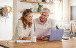 © Nina Lawrenson/peopleimages.com - Retirement, finance and couple with budget on laptop satisfied with home expenses in New Zealand. Happy, positive and married senior people checking financial documents for investment payment.