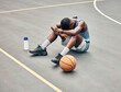 © C Coetzee/peopleimages.com - Basketball man, sports burnout and game fatigue on court sport training, muscle injury from exercise on ground and sad with mistake. Sick, depressed and african american athlete with competition pain