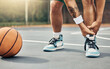 © Clement Coetzee/peopleimages.com - Basketball, ankle in pain and injury from sports or accident on the court in a fitness game or training match outdoors. Athlete suffering with muscle inflammation, hurt leg joint or a broken bone