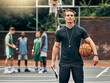 © Clement Coetzee/peopleimages.com - Coach, man and basketball portrait on court training for match, game or competition. Exercise, sports and mindset, vision and motivation of trainer in Canada for workout fitness, wellness and health.