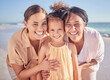 © Alex S/peopleimages.com - Family, love and children with a girl, mother and grandmother on the beach for summer vacation. Portrait, travel and nature with a senior woman, daughter and kid by the sea or ocean in Hawaii