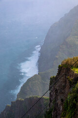 Farol da Ponta do Pargo coastline on rainy day