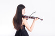 © 大 李 - Young woman playing violin on white background
