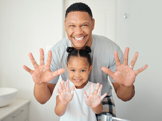 Poster - Black family with soap on hands in bathroom for bacteria cleaning safety, learning or teaching hygiene healthcare portrait. Wellness father showing girl child how to wash germs with foam for skincare