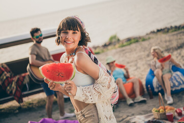 Wall Mural - Photo of positive lady hippie chilling best fellows guys hold tasty watermelon breakfast outdoors sea coast party