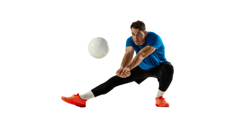 Dynamic portrait of male volleyball player training with ball isolated on white studio background. Sport, gym, team sport, challenges