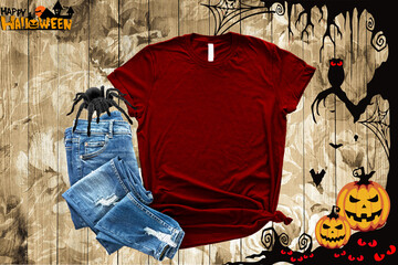 Wall Mural - Mockup of a halloween Marron T-Shirt Blank Shirt Template Photo with Fall accessories and wooden background halloween shirt mockup	