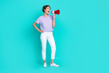 Sticker - Full length photo of excited charming girl dressed purple t-shirt telling announcement looking empty space isolated teal color background