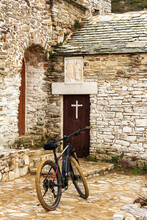 An E-bike At The Orthodox Monastery Saints Asomatos In Penteli, A Mountain To The North Of Athens In Greece