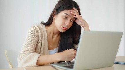 Office syndrome. Overworked tired young asian woman feeling headache, having eyesight problem after computer laptop work. Stressed young woman suffering from fatigue at home