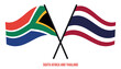 South Africa and Thailand Flags Crossed And Waving Flat Style. Official Proportion. Correct Colors.