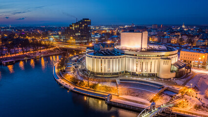 Wall Mural - Downtown of Bydgoszcz at dusk in winter, Poland. Aerial view
