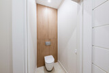 Fototapeta Tulipany - clean new toilet in the house. wooden cabinets in the toilet
