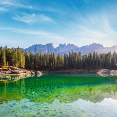 Canvas Print - sunny colorful autumn alpine dolomites mountain scene, sudtirol, italy. karersee or lago di carezza 
