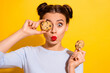 Photo of pretty flirty lady wear long sleeve holding biscuits cover eye pouted lips isolated yellow color background