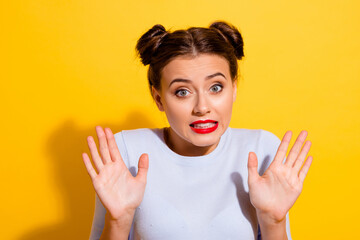 Wall Mural - photo of unhappy young woman with red lipstick ask you to stop don't come closer isolated on yellow 