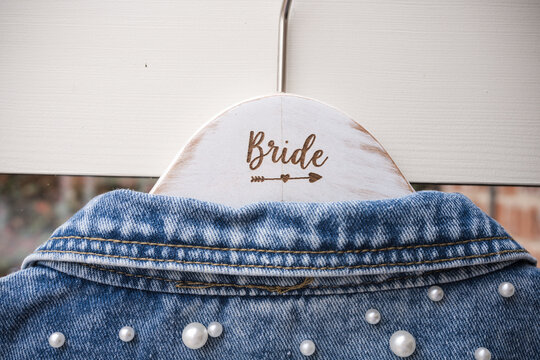 Bride wedding dress hanger with arrow pointing to bridal suite