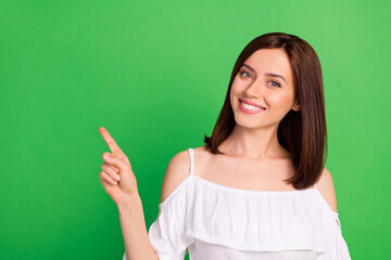 Poster - Photo of pretty lady satisfied bright grin rejoice whitening teeth offer dentist procedure empty space isolated on green color background